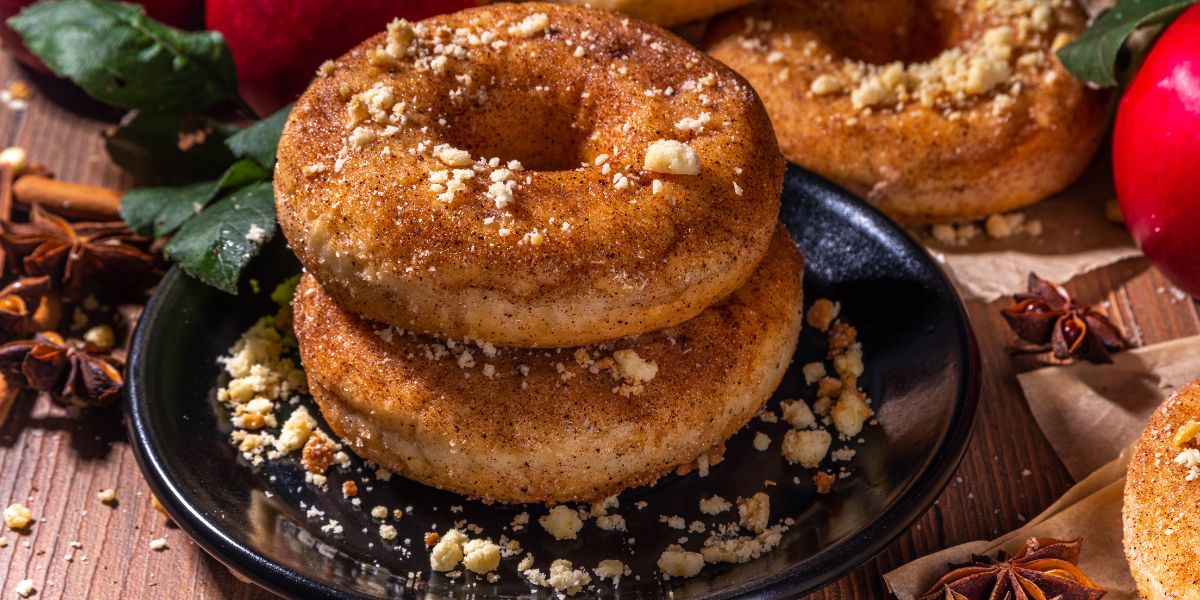 Indulge in the sweet warmth of these baked cinnamon donuts